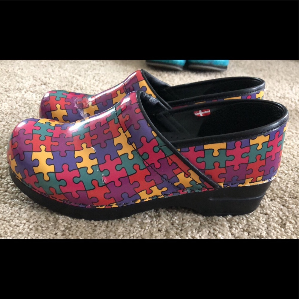 Fair condition autism awareness Sanita clogs.